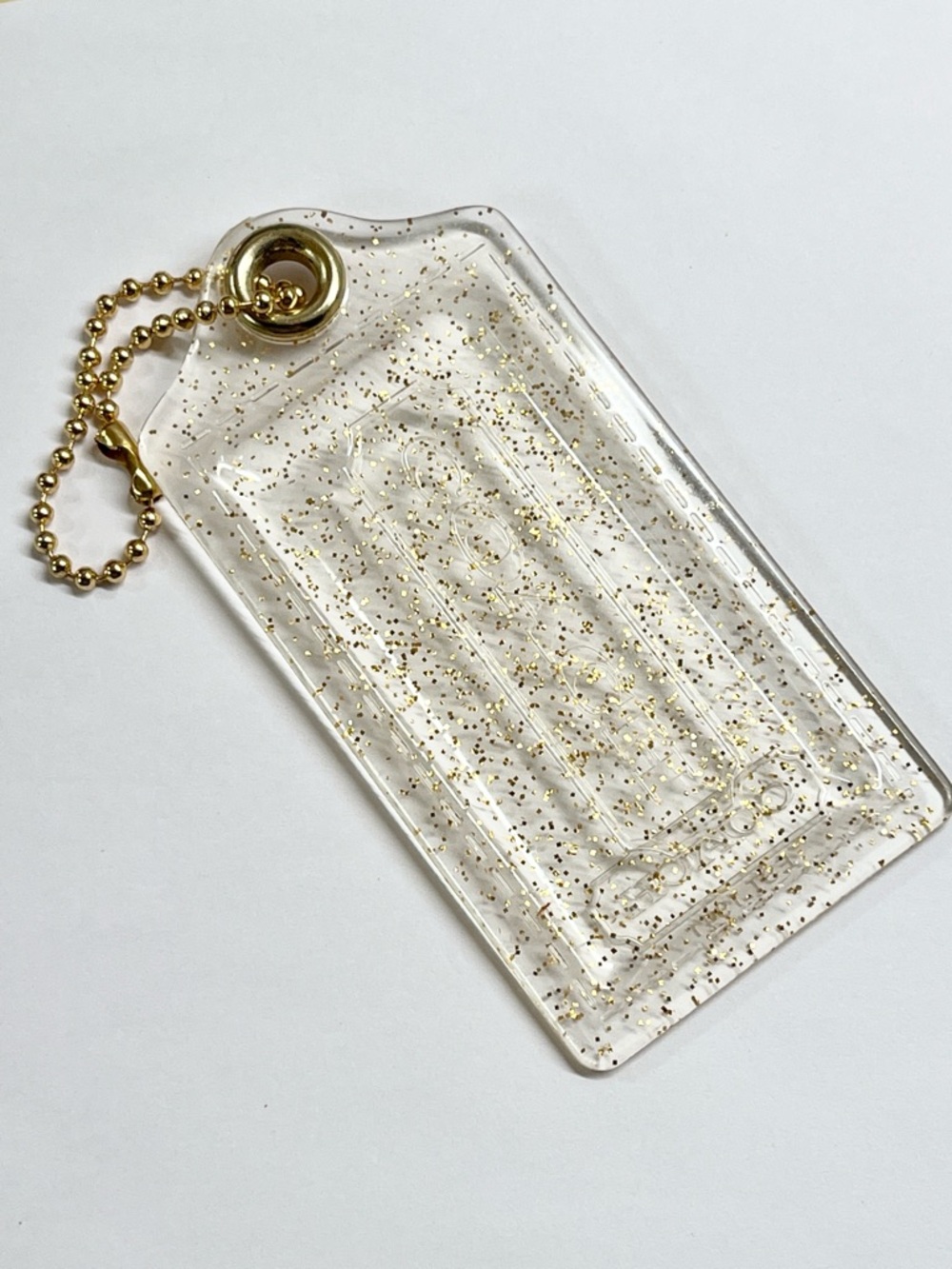 Coach Poppy Clear with Gold Glitter Hang Tag 3 1/2 inches wide EUC